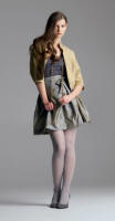 New Look UK - Brocade evening jacket �35, Grey vest �6, Taffeta skirt with bow �25, Necklace �7, Shoes �20.